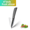 A black fruit slicer knife is shown next to a small pile of fresh herbs and vegetables.
