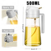 A 500ml 2-in-1 oil sprayer bottle with a pump and a spout, shown in yellow oil.