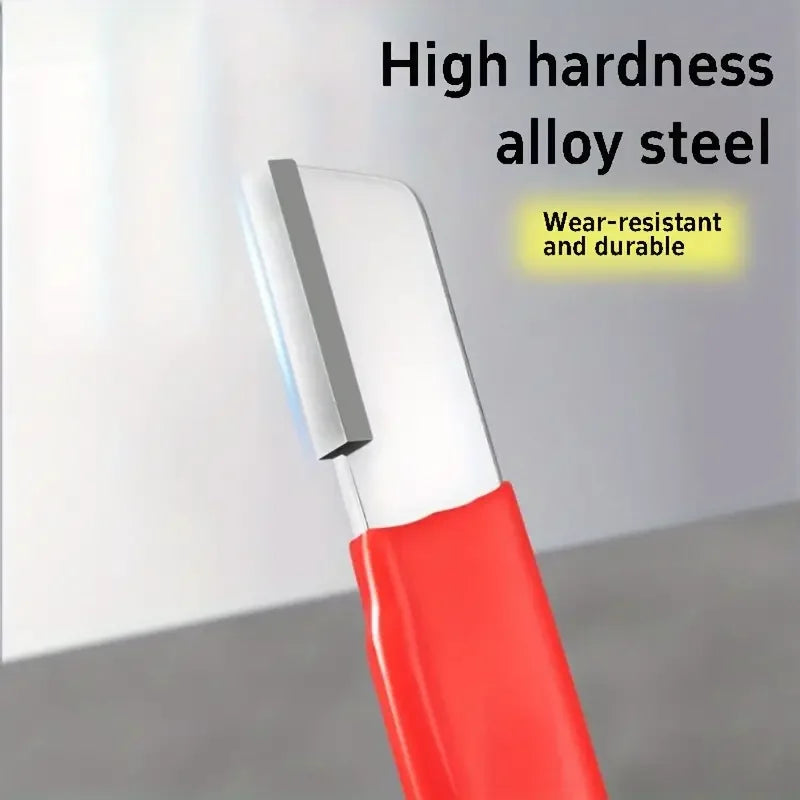 A close-up view of a red and silver multi-material knife sharpener with a sharp blade.