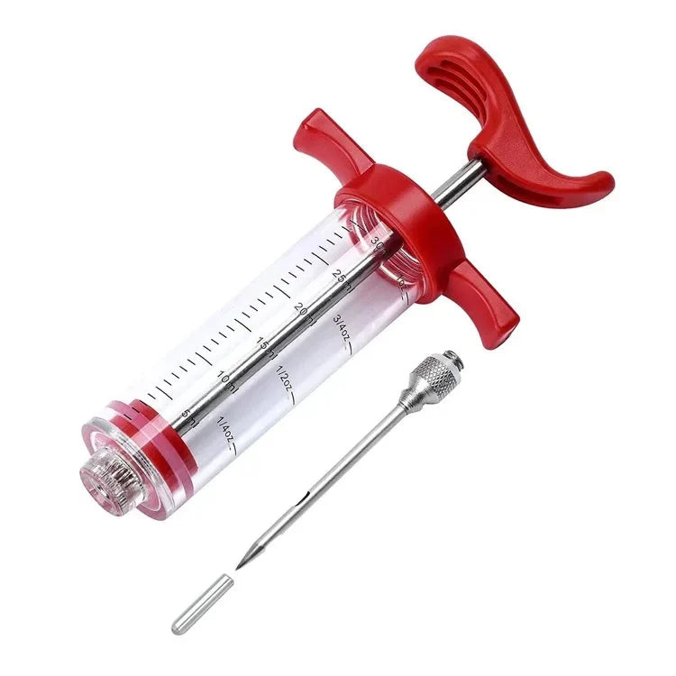 A red multi-function meat and poultry injector kit with a syringe and plunger.