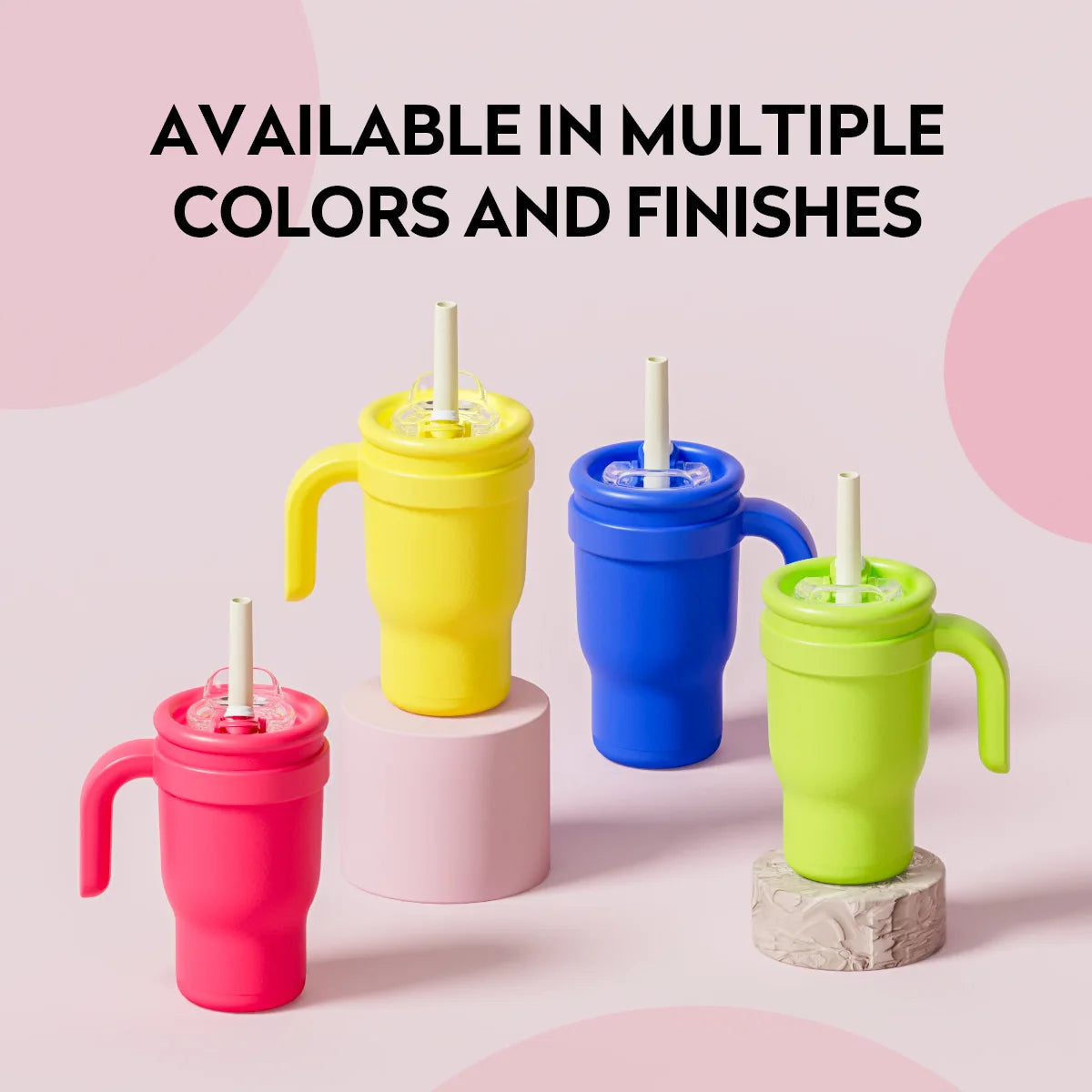 A collection of contrasting color stainless steel straw tumblers in yellow, blue, pink, and green displayed on a light backgr