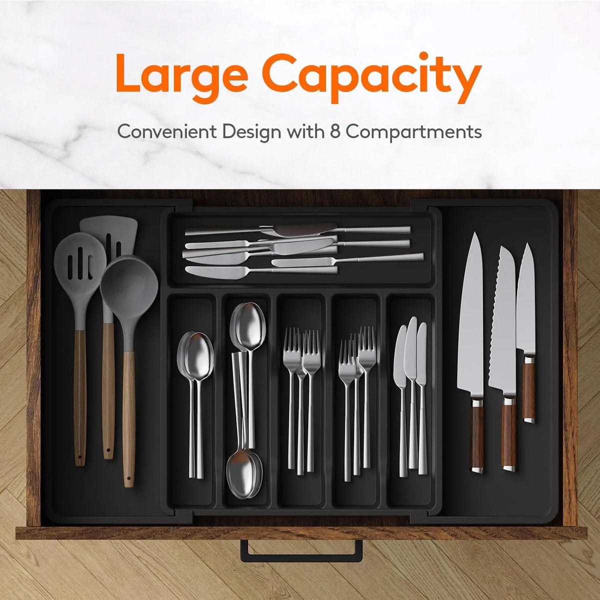A large capacity silverware drawer organizer with 8 compartments for kitchen utensils.