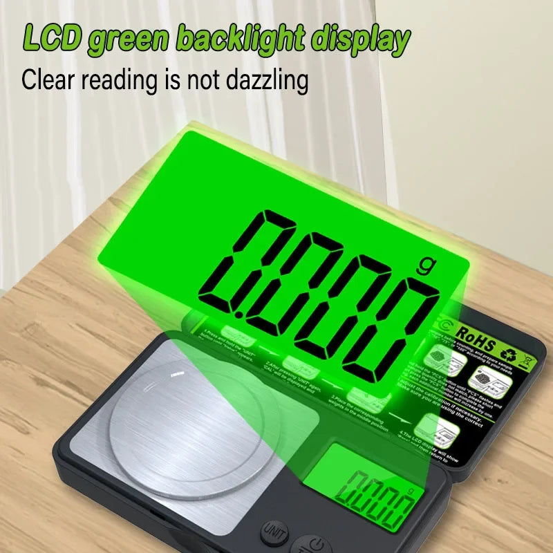 A digital jewelry scale with a green LCD display showing 0.0000 grams.