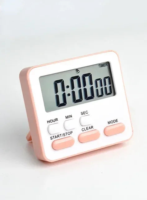 A pink digital kitchen timer with a display showing 0:00:00 and buttons for start, stop, clear, and mode.