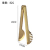 A pair of gold-toned stainless steel BBQ tongs and grill clamps shown against a white background.