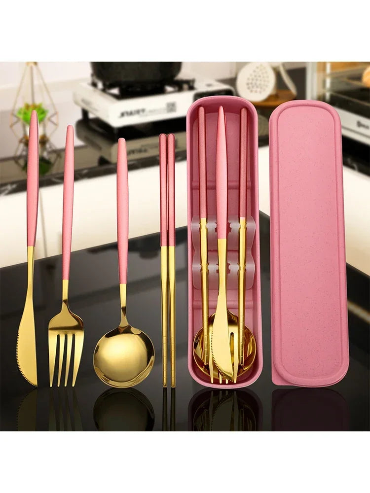 A pink and gold reusable stainless steel cutlery set with individual utensils stored in a pink case.