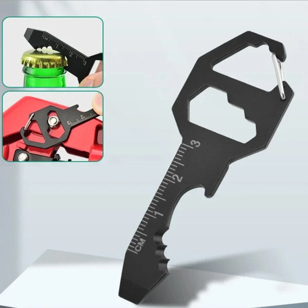 Schwarzes Multitool mit Linealskala neben Messkomponenten und einem Schlüsselanhänger.