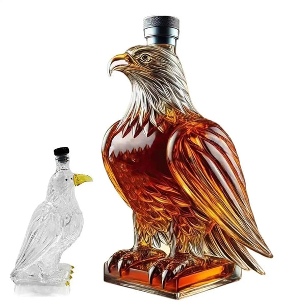 A glass whiskey decanter shaped like a detailed golden eagle