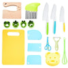 A set of yellow and green plastic cutting tools for toddlers, including a cutting board, various cutters, and a spatula.