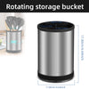 A silver rotating storage bucket for utensils with a black base, shown in a side view.