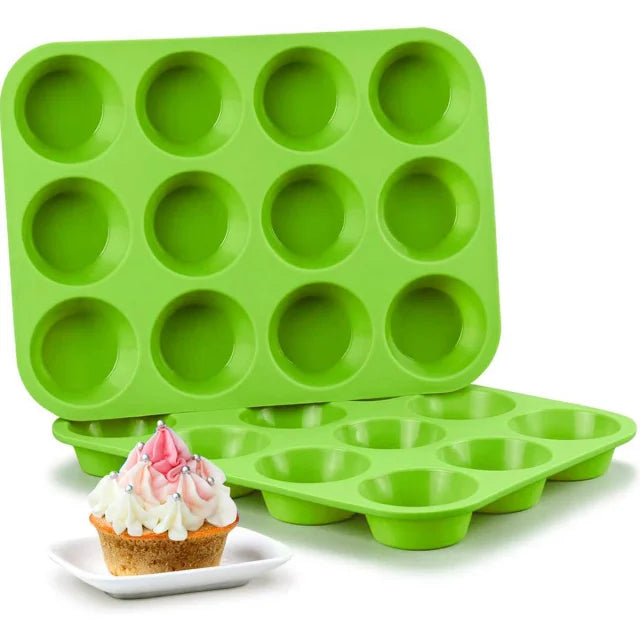 A green silicone muffin and cupcake baking mold set with multiple cavities.