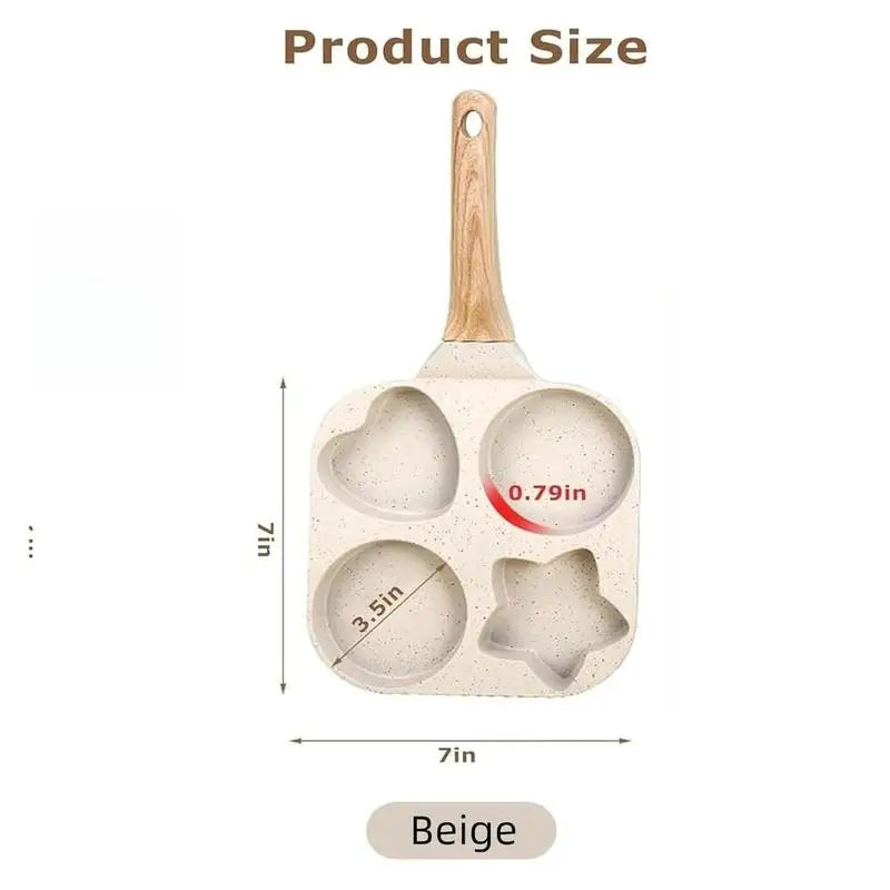 A beige silicone egg frying pan with a wooden handle showing four indentations for cooking eggs.