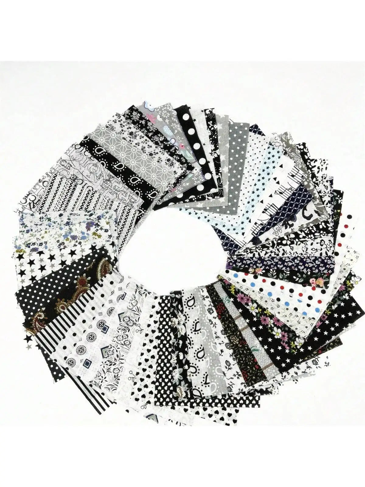 A circular arrangement of square printed cotton fabric packs featuring various black and white patterns.