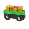 A wooden magnetic train car set featuring a yellow striped box on a green track.