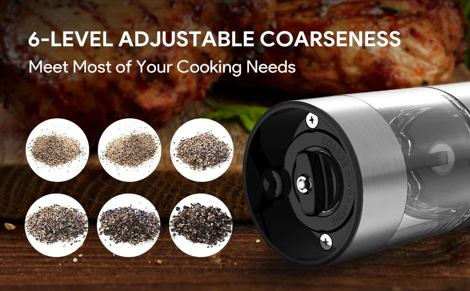 A close-up view of a silver electric salt and pepper grinder with six levels of adjustability, set against a wooden backgroun