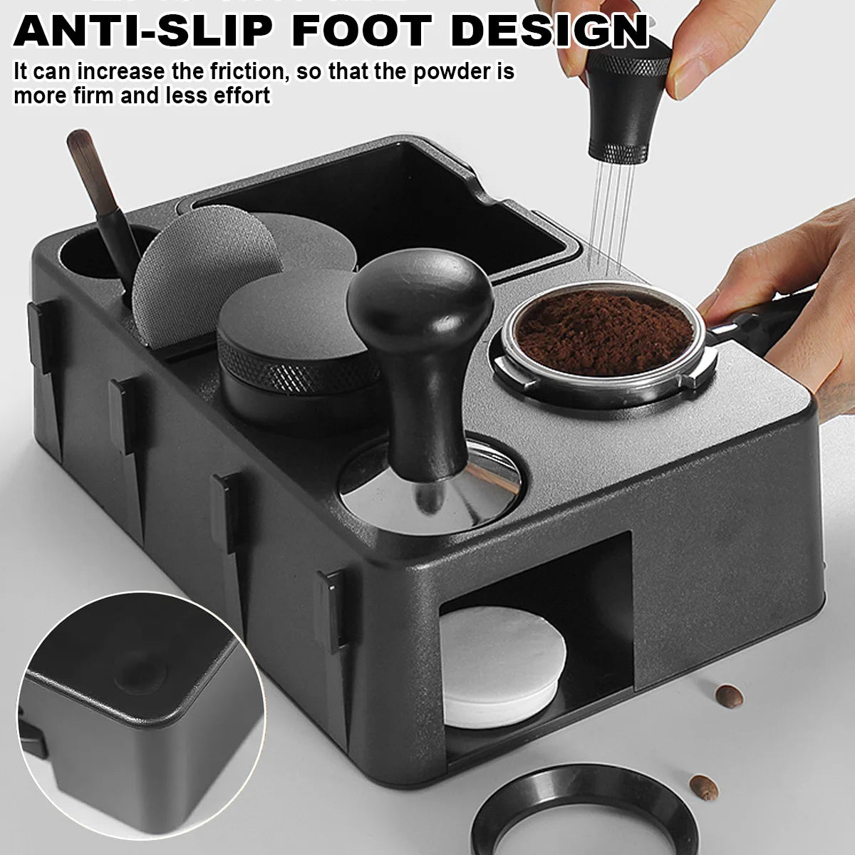 A black espresso tamping station organizer with multiple compartments and a hand applying powder to a portafilter.