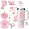 A pink tumbler accessory kit featuring a silicone boot, straw covers, and charm, with a large letter P decoration.