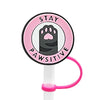 Pink silicone straw cover with a black paw print design and the word STAY PAWSITIVE