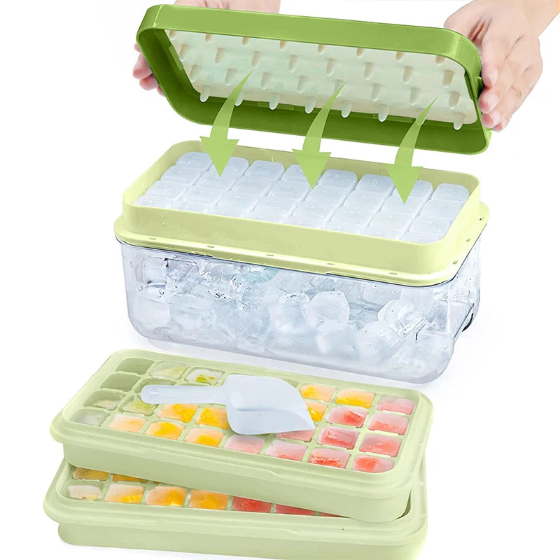 A stackable silicone ice cube tray set with a clear storage bin and an additional tray of colored ice cubes.