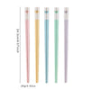 A set of colorful alloy chopsticks featuring heart-shaped tips in pink, yellow, blue, and green.