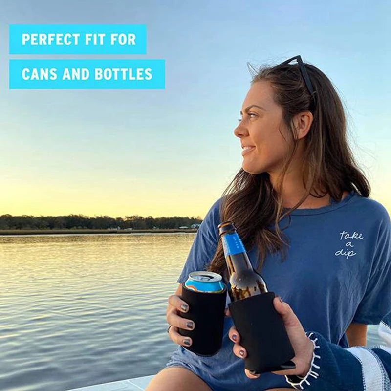 A woman holds a reusable foam insulated beverage sleeve while sitting outdoors near water.