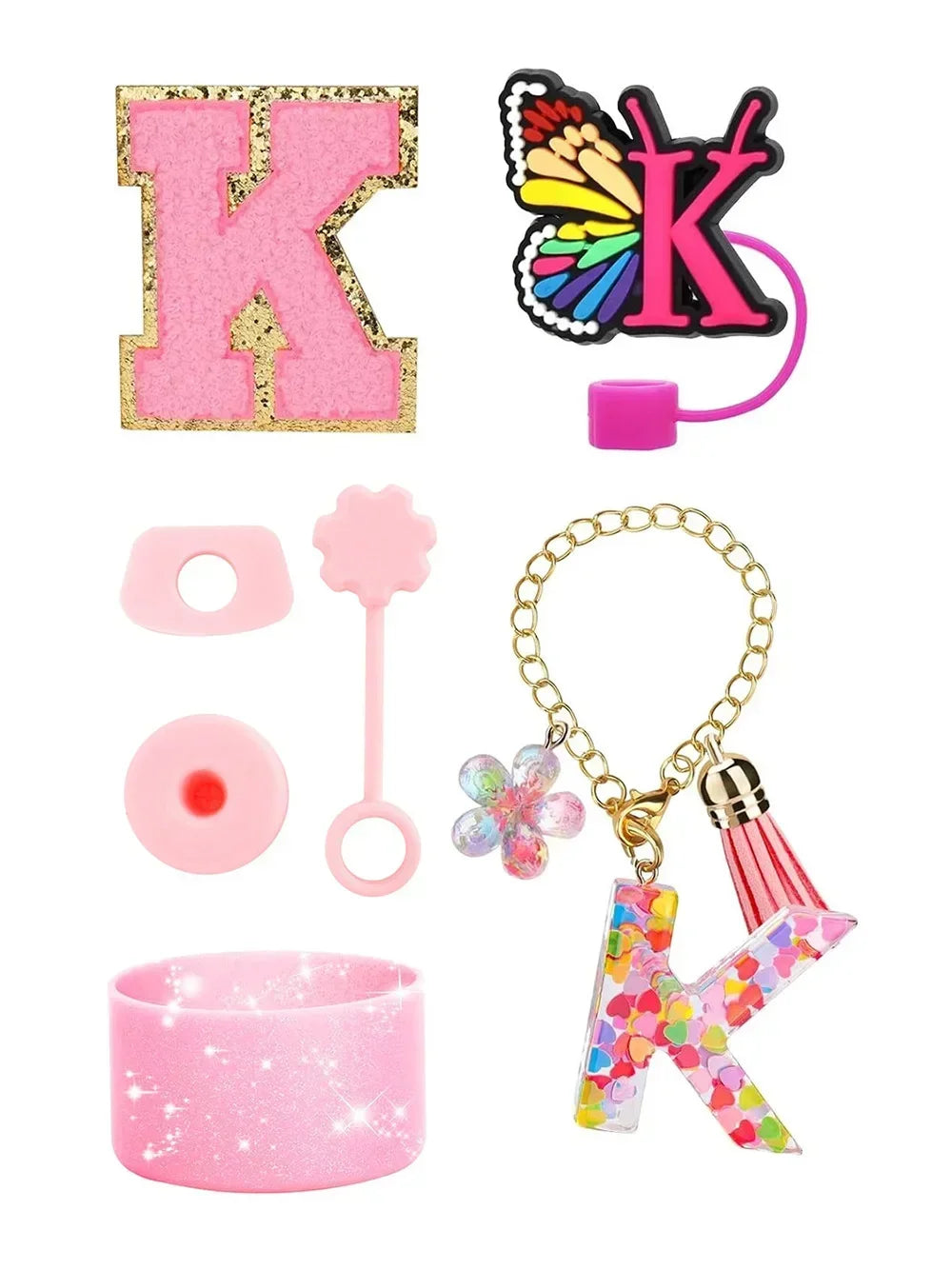 A set of silicone straw covers and a glitter tumbler, including a pink letter K charm.