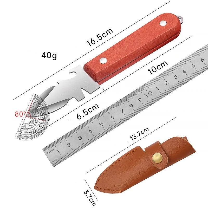 A stainless steel oyster and shell opener with a wooden handle shown next to a ruler.