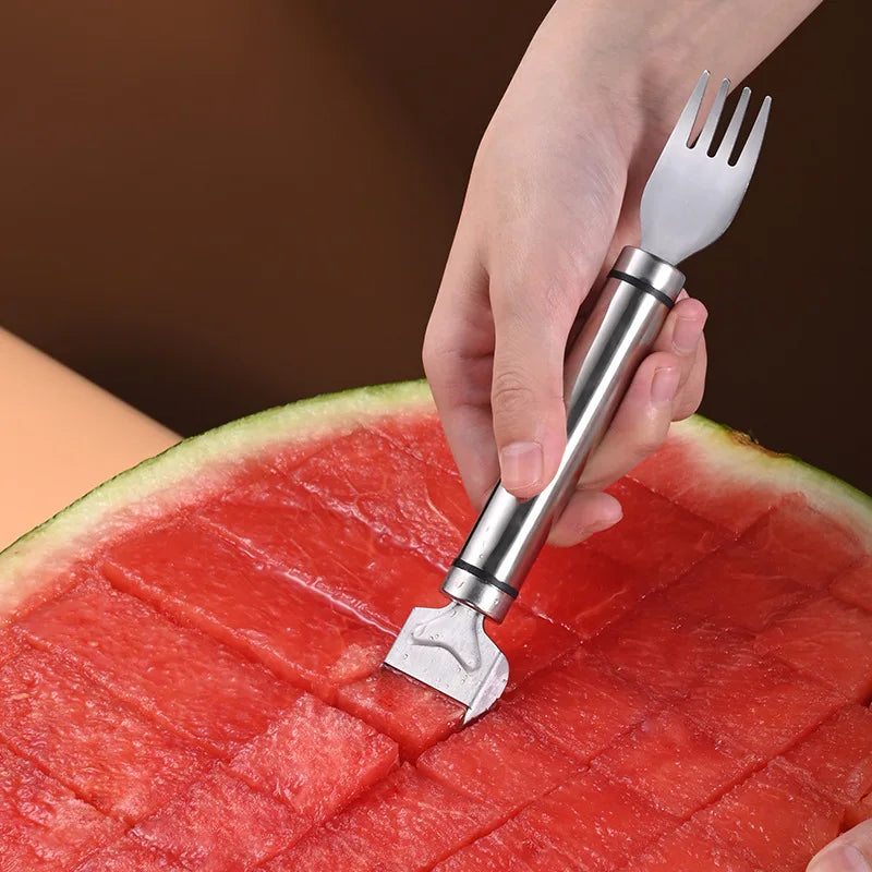 A hand uses a stainless steel watermelon cutting and slicing tool to cut slices into a watermelon.