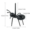 A set of reusable animal appetizer forks featuring a black insect-like design.
