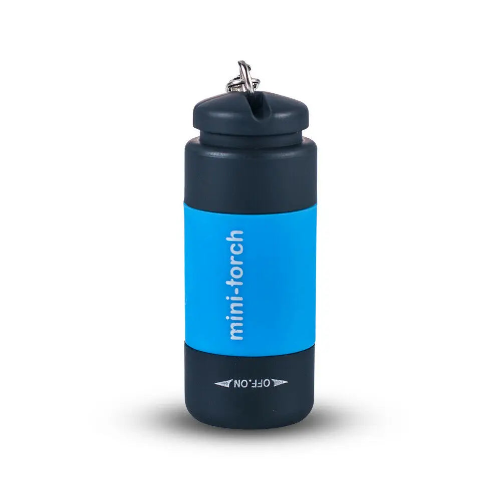 A small, black and blue mini-torch flashlight with a keychain clip.