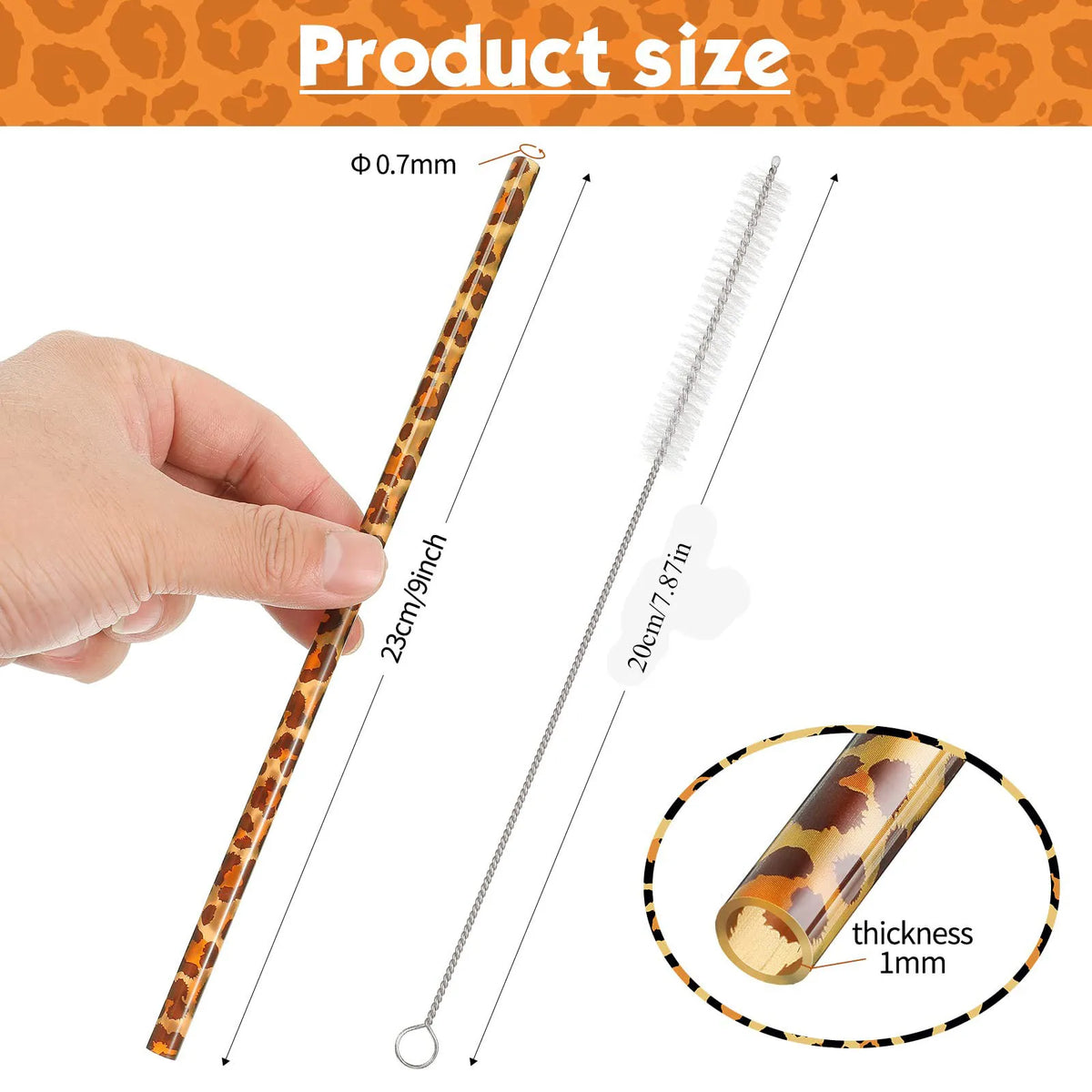 A reusable plastic straw set with a cleaning brush is shown next to a hand, illustrating its size and thickness.