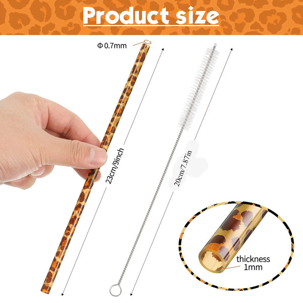 A reusable plastic straw set with a cleaning brush is shown next to a hand, illustrating its size and thickness.