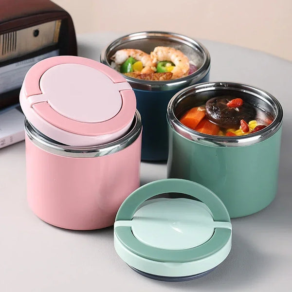 Pink and green insulated stainless steel food jars with lids containing food