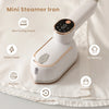 A white mini steamer iron is shown on a white cloth, highlighting features like 1200W power and 5s heating.