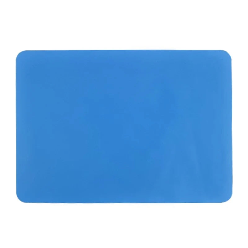 A rectangular, bright blue silicone craft mat used for jewelry and baking.