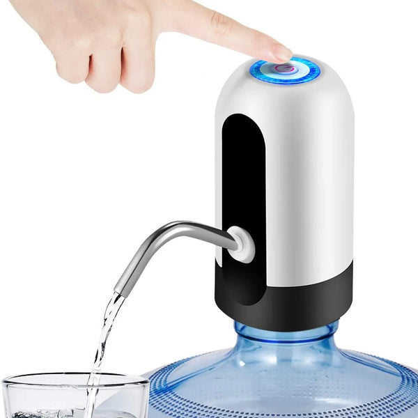 A hand is pouring water into a white automatic USB charging water dispenser pump attached to a blue bottle.