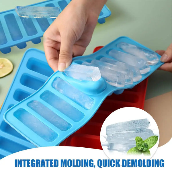 A hand is using a blue silicone ice cube tray with an integrated molding feature to make ice cubes.