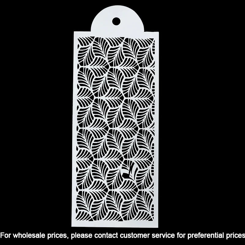 White laser-cut stencil for cake decoration featuring a repeating leaf pattern.