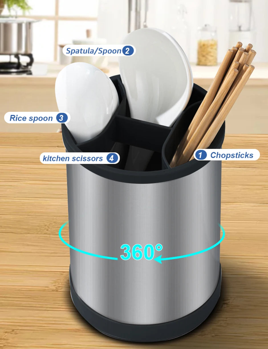 A silver rotating stainless steel cutlery drainer holding chopsticks, spoons, and a spatula.