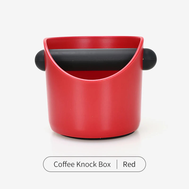 A red coffee knock box with a black lid shown against a white background.