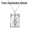 A silver stainless steel necklace featuring a tarot card design of The Hanged Man.