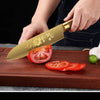 A set of golden rose stainless steel knives, including a chef knife and a fruit knife, are shown being used for cutting food.