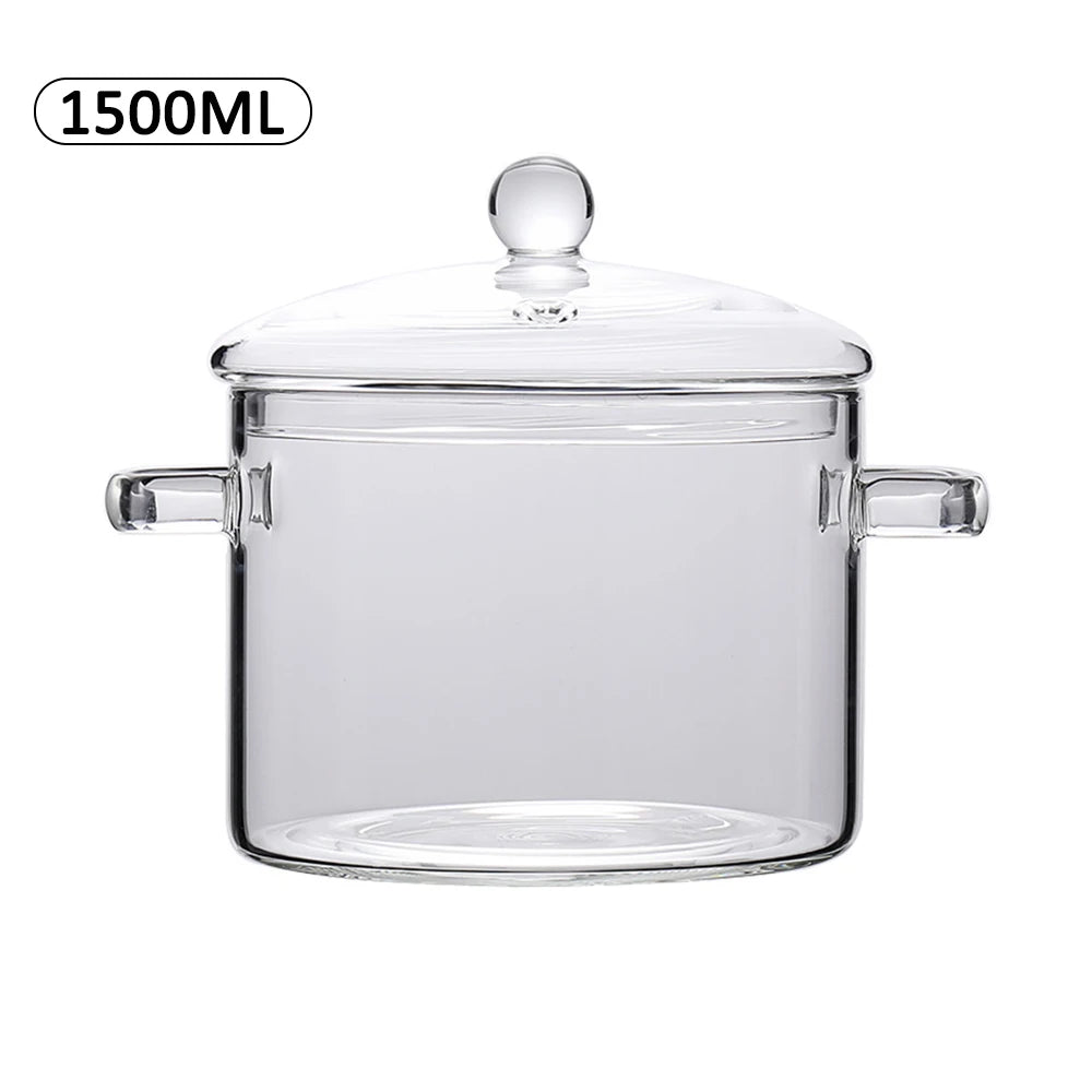 Una olla de vidrio transparente con tapa y asas, diseñada para cocinar de todo.