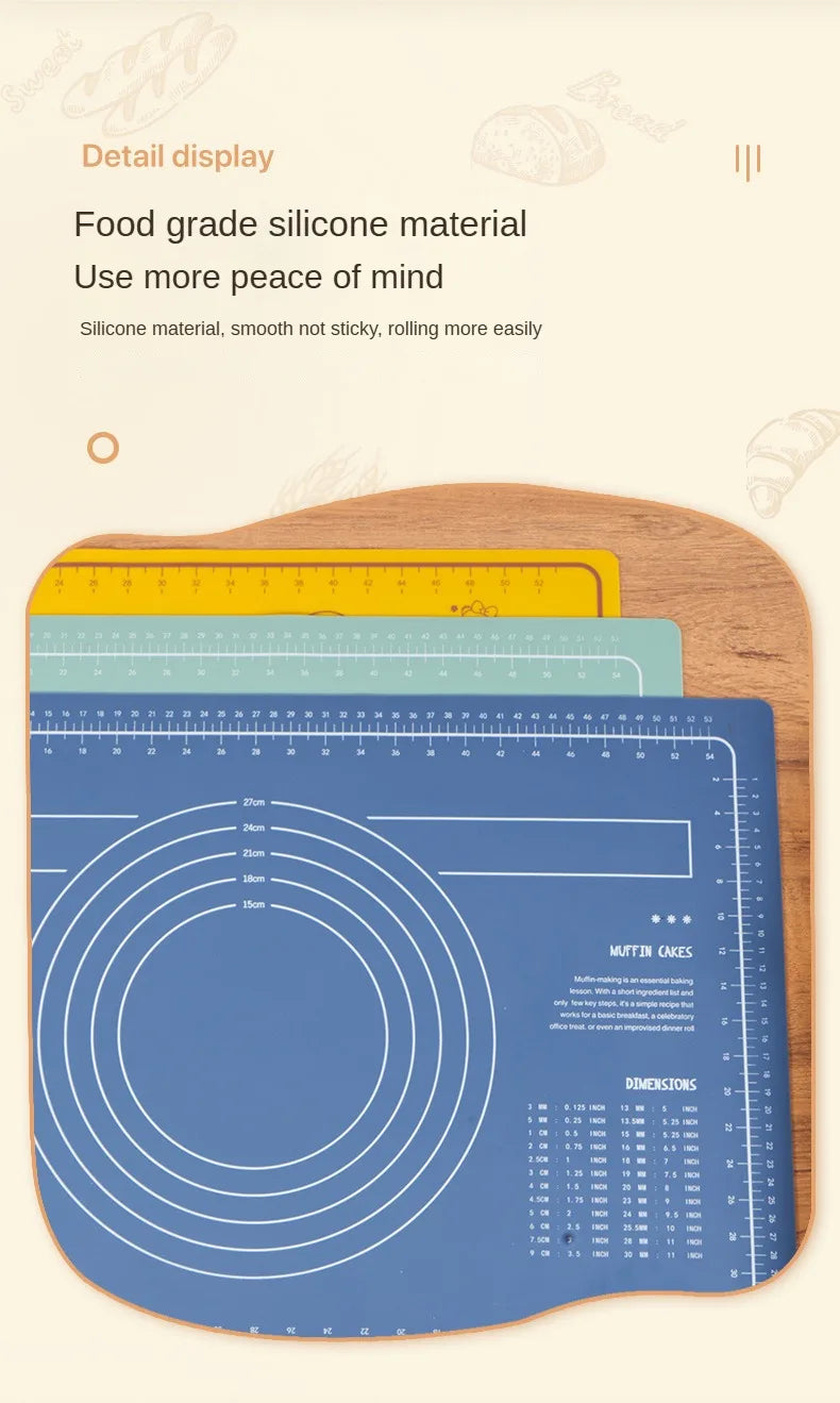 A silicone rolling pin and baking mat set displayed on a wooden surface with measurement markings.