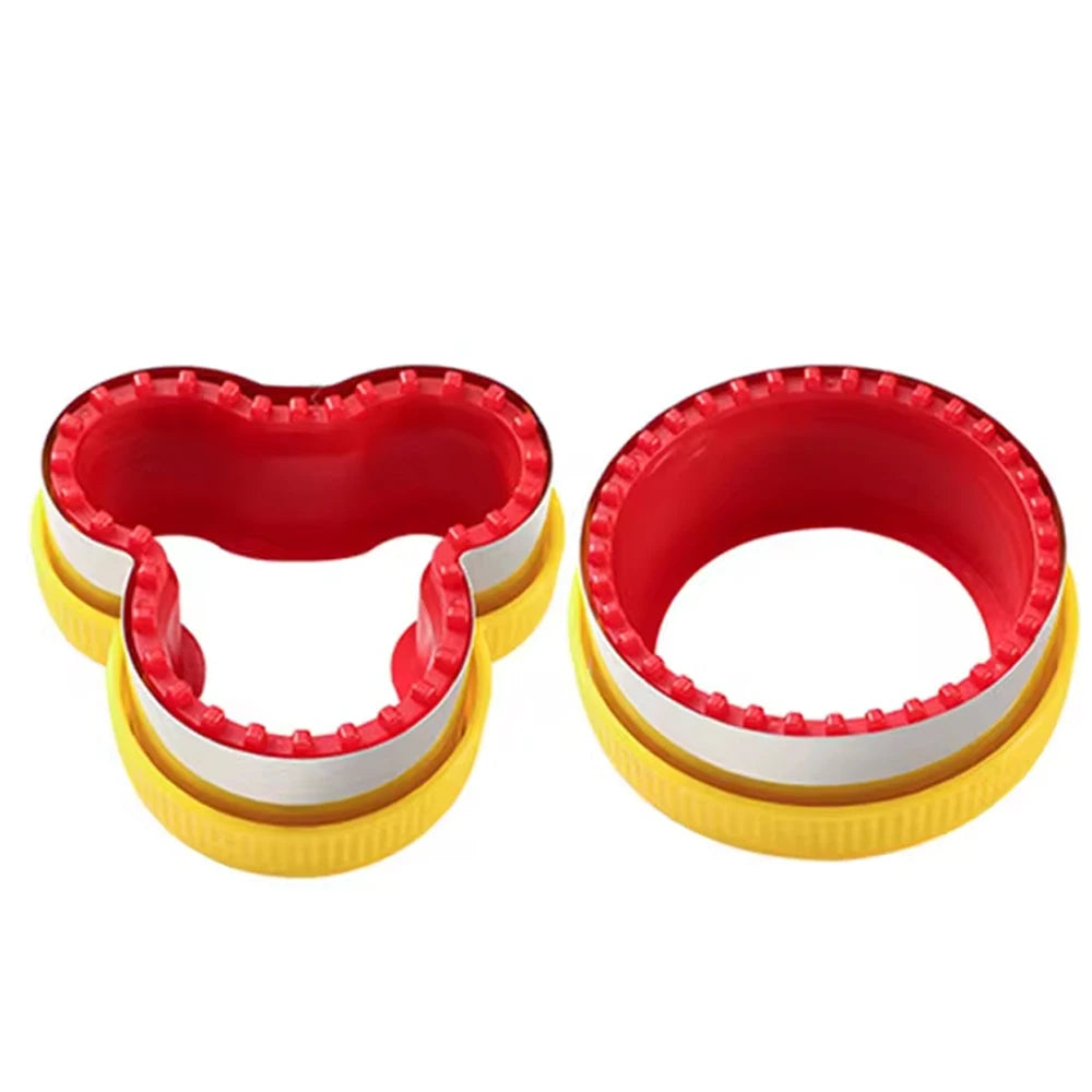 A set of two red and yellow geometric sandwich cutters and sealers.