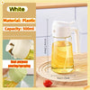 A clear plastic oil spray bottle with a white pump dispenser is shown on a wooden cutting board.