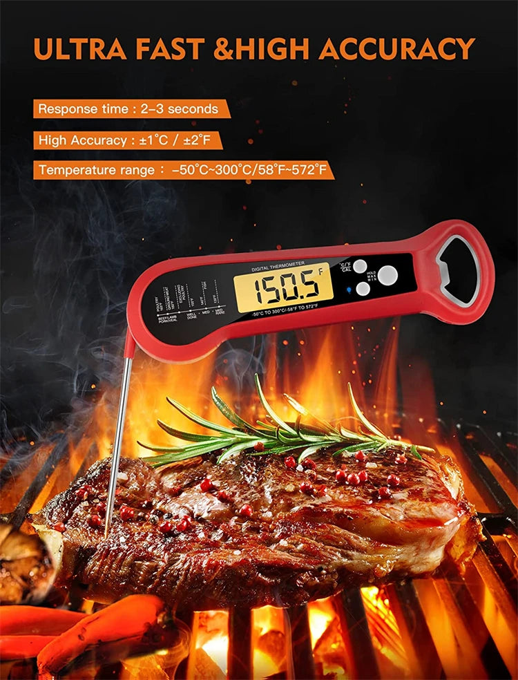 A red digital meat thermometer measures the internal temperature of a grilled steak over an open fire.