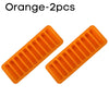Two orange silicone ice cube trays with an easy pop-out design.