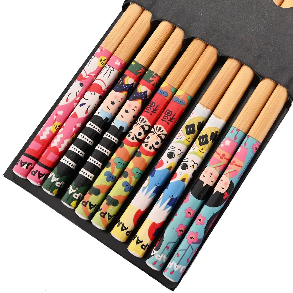 A set of reusable bamboo chopsticks featuring colorful, cute designs for dining.
