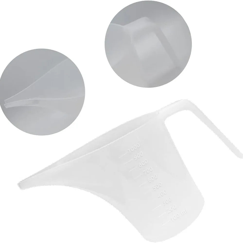 A clear plastic measuring funnel pitcher with volume markings for baking and household use.